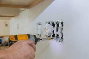 Work,On,Installing,Electrical,Outlets,With,Electrical,Wires,And,Connector