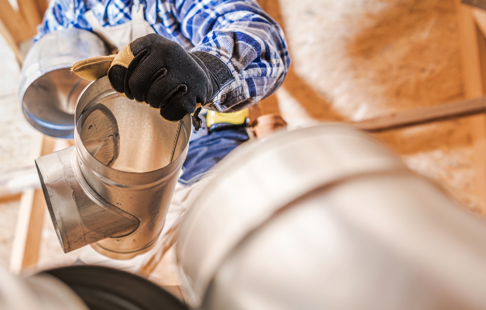 Close,Up,Of,Hvac,Worker,Fitting,Pipe,Connections,Of,Air